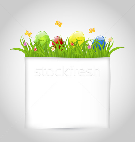 Easter colorful eggs in green grass with empty paper for your te Stock photo © smeagorl