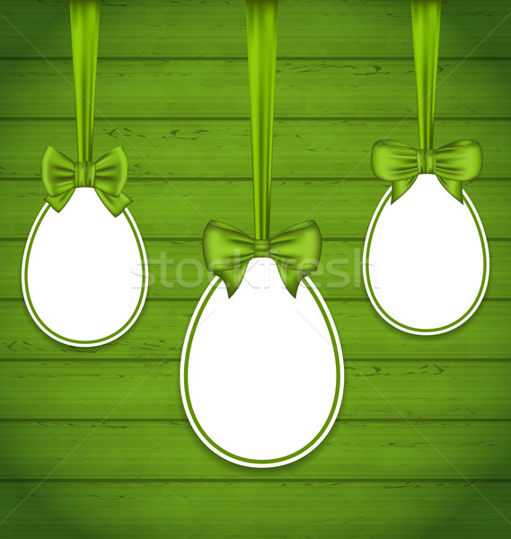 Easter eggs wrapping green bows Stock photo © smeagorl