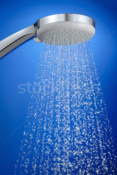 Fresh shower, crisp drops on blue background Stock photo © Smileus
