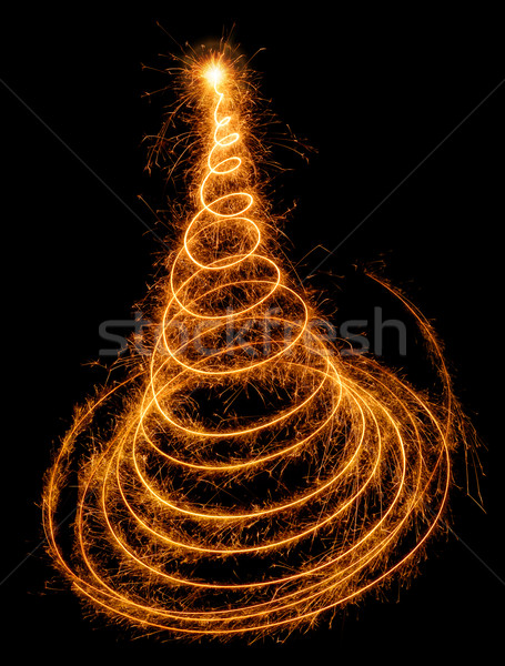 Nice Christmas tree drawn with sparkling light Stock photo © Smileus