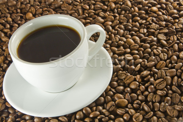 Schwarzer Kaffee Bohnen Kaffeebohnen Tasse Kaffee trinken Stock foto © smoki