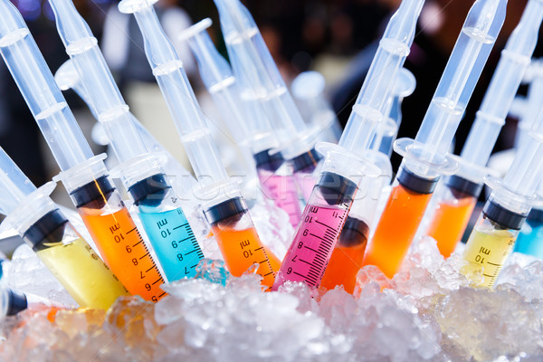 Flüssigkeit Drogen Spritze farbenreich Elixier Kunststoff Stock foto © smuay