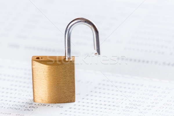 Key or padlock open on passbook Stock photo © smuay