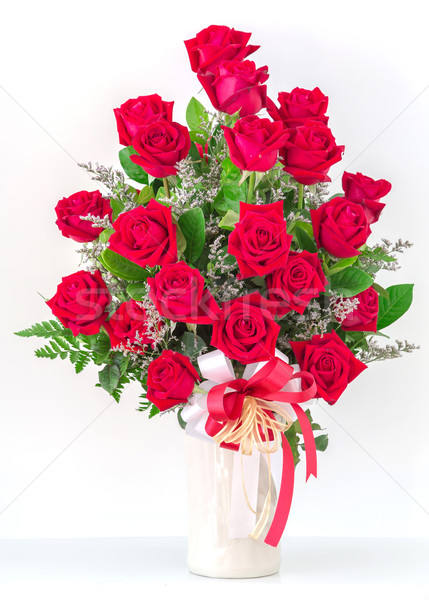 Сток-фото: букет · красные · розы · ваза · весны · лист · оранжевый