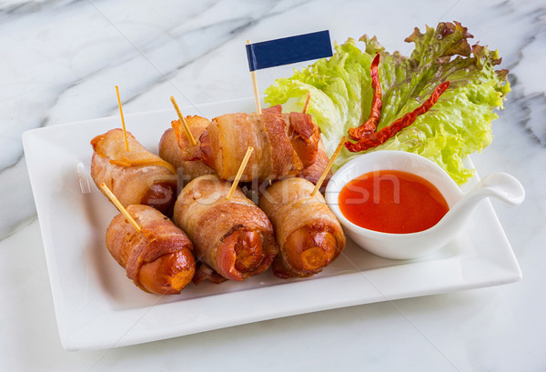 Lard saucisses profonde frit roulé servi Photo stock © smuay