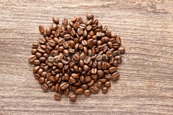 Coffee beans on wooden background Stock photo © smuay