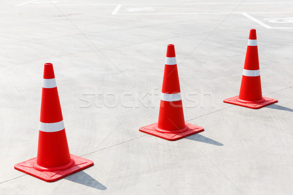 Traffic cone on concrete floor Stock photo © smuay