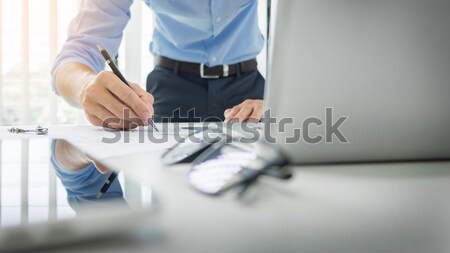 Two confident business man shaking hands during a meeting in the Stock photo © snowing