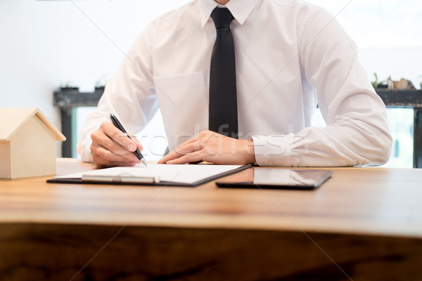 customer signing contract, agreed terms and approved application Stock photo © snowing