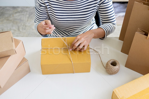 Negócio proprietário mulher trabalhando compras on-line produto Foto stock © snowing