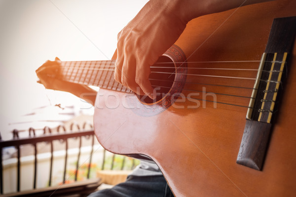 boys hand with a guitar Stock photo © snowing