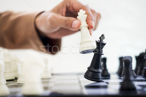 Business Strategic Formation in the chess game king is checkmate Stock photo © snowing