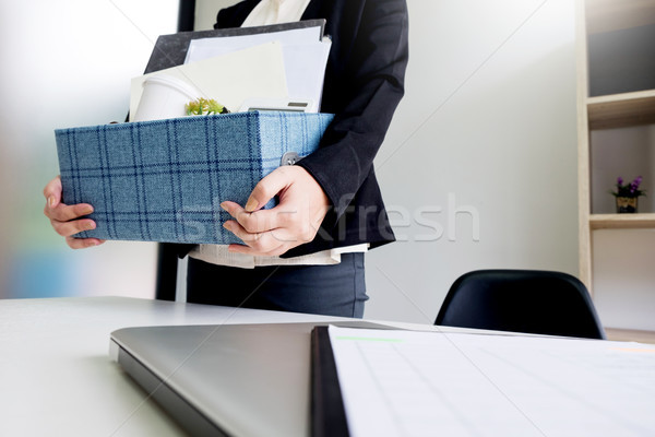business woman packing personal company belongings when she deci Stock photo © snowing