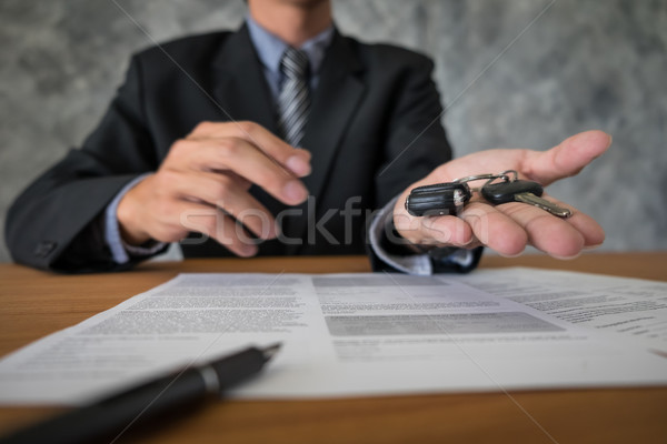 transportation and ownership concept - customer and salesman wit Stock photo © snowing