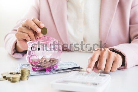 business man counting money at the table, accounting concept. Stock photo © snowing