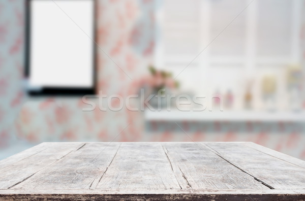 Selected focus empty brown wooden table and Coffee shop blur bac Stock photo © snowing