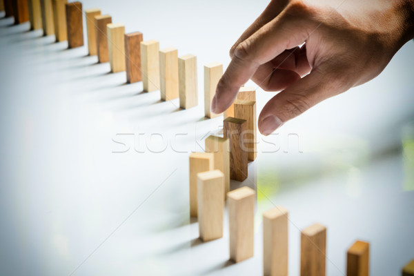 Place a wooden block lines Business man solving a problem Stock photo © snowing