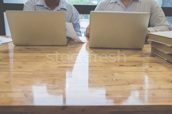 Business team working on a new business plan with modern digital Stock photo © snowing