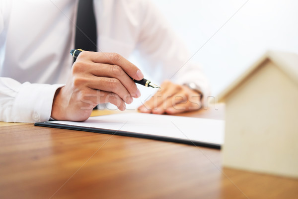 customer signing contract, agreed terms and approved application Stock photo © snowing