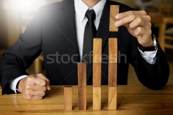 Növekvő érték kéz üzletember felfelé fából készült Stock fotó © snowing