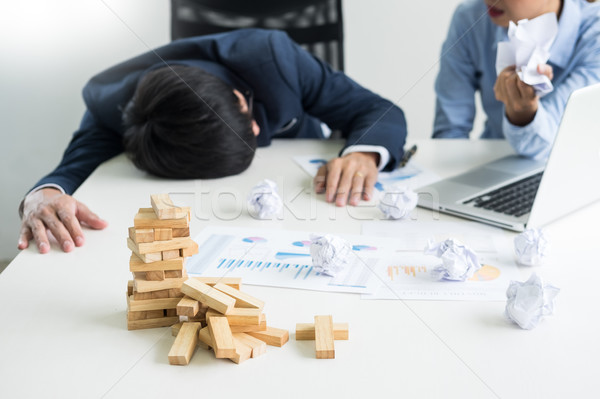 Depressed failure and tired businessman late sad and solving pro Stock photo © snowing