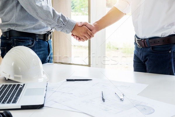 architecture and home renovation concept - builder with blueprin Stock photo © snowing