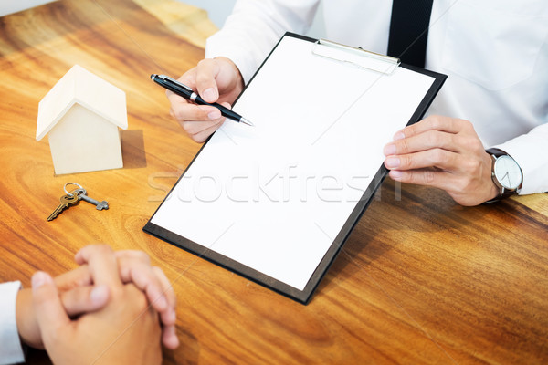 customer signing contract, agreed terms and approved application Stock photo © snowing
