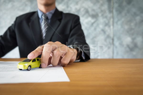 transportation and ownership concept - customer and salesman wit Stock photo © snowing