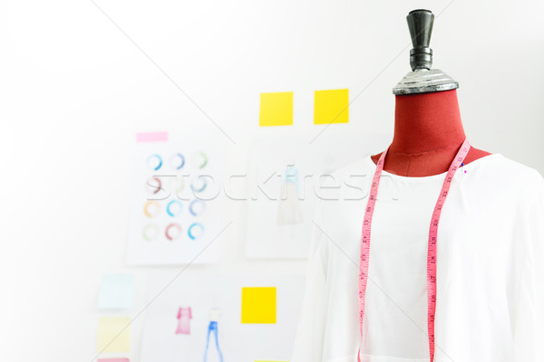 garment design on mannequin Red dummy with measuring tape in tai Stock photo © snowing