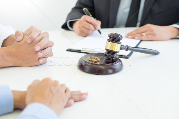 Angry couple arguing telling their problems to Judge gavel decid Stock photo © snowing