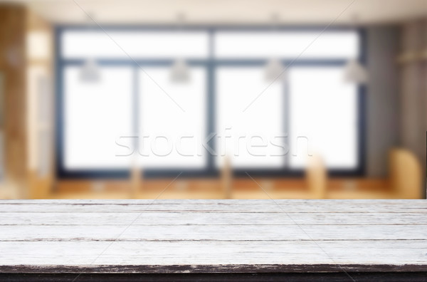 Empty of wood table top on blur of window glass in the morning b Stock photo © snowing
