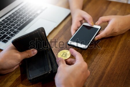 hand exchange golden metal Bitcoin crypto currency investment- s Stock photo © snowing