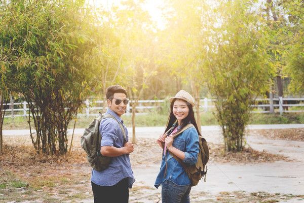 Outdoor shot of happy young loving couple hikers at valley of th Stock photo © snowing