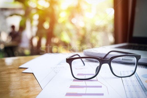 Office workplace with laptop and glasses on wood table Stock photo © snowing