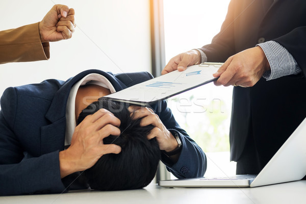 Group Of Angry Business people Blaming Male Colleague In Meeting Stock photo © snowing
