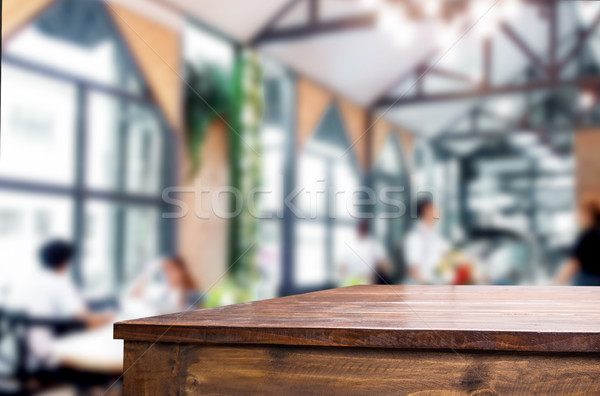 Selected focus empty brown wooden table and Coffee shop blur bac Stock photo © snowing