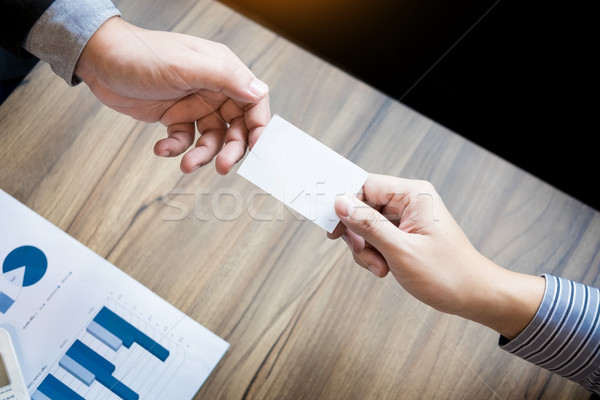 business executive man exchanging business card for start good c Stock photo © snowing