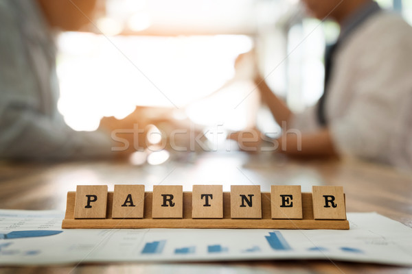 partner word on wood table with business man discuss for work du Stock photo © snowing