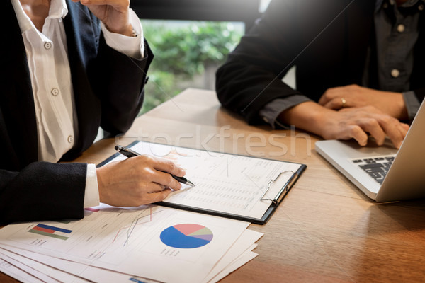 Businessman team working at office desk and using a digital comp Stock photo © snowing