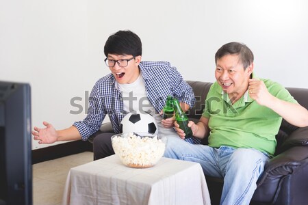 friendship, sports and entertainment concept - happy male friend Stock photo © snowing