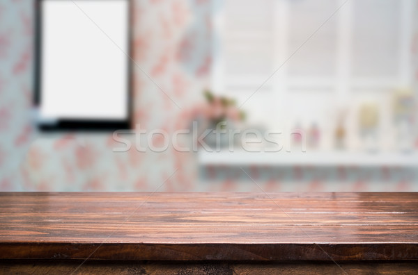 Selected focus empty brown wooden table and Coffee shop blur bac Stock photo © snowing