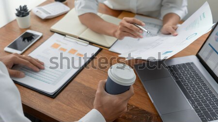 Businessman conducting an interview with businessman in an offic Stock photo © snowing