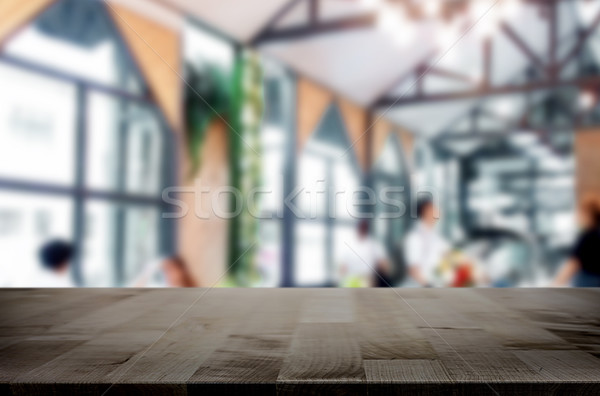 Selected focus empty brown wooden table and Coffee shop blur bac Stock photo © snowing