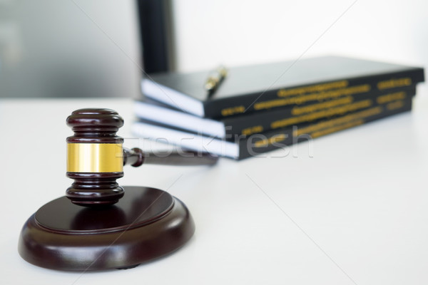 gavel Judge hammer with legal book on brown wooden desk with cop Stock photo © snowing