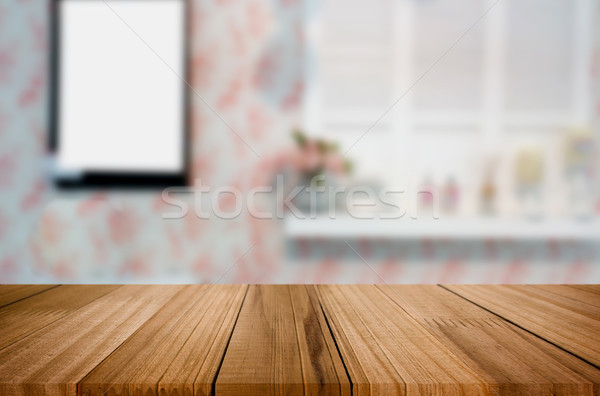 Selected focus empty brown wooden table and Coffee shop blur bac Stock photo © snowing