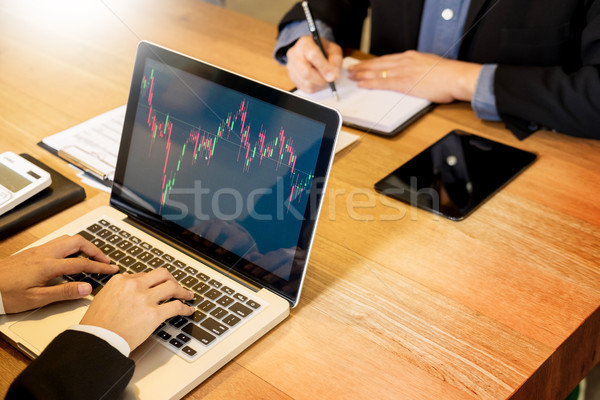 Finance trade manager showing reports screen analysis finance cu Stock photo © snowing