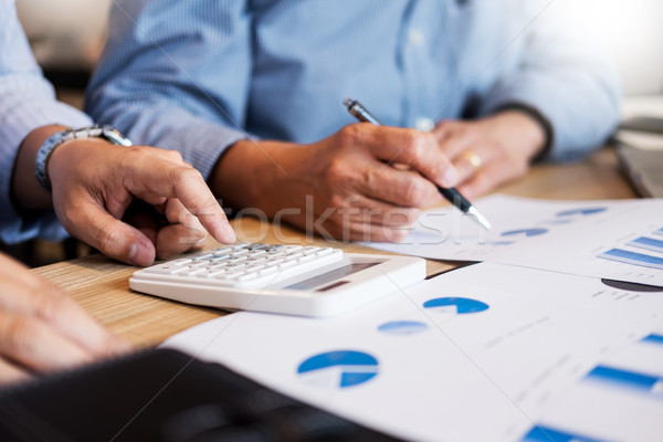 Stock photo: Team work process. young business managers crew working with new