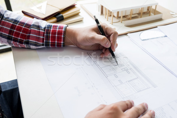 Person's engineer Hand Drawing Plan On Blue Print or working pro Stock photo © snowing