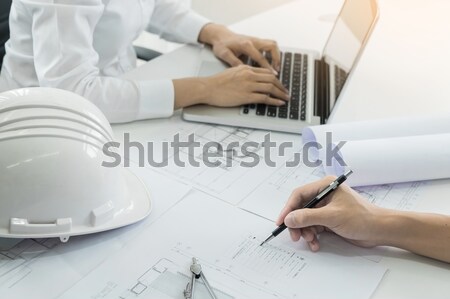 Close-up Of Person's engineer Hand Drawing Plan On Blue Print wi Stock photo © snowing