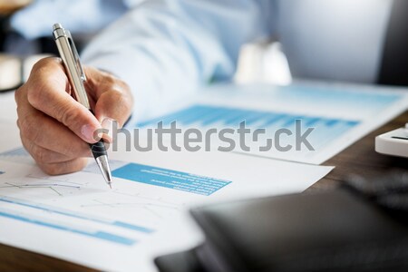 business men working on wooden desk(table) with notebook compute Stock photo © snowing